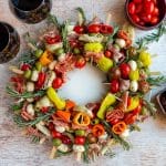 Italian Antipasto Wreath Charcuterie Skewers with 2 glasses of wine.