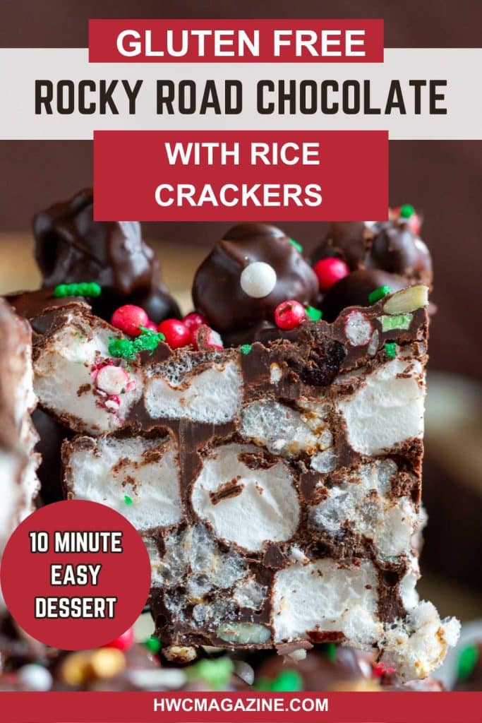 Chocolate rice cake rocky road bar showing all the crunchy crackers and trail mix and chewy marshmallows.