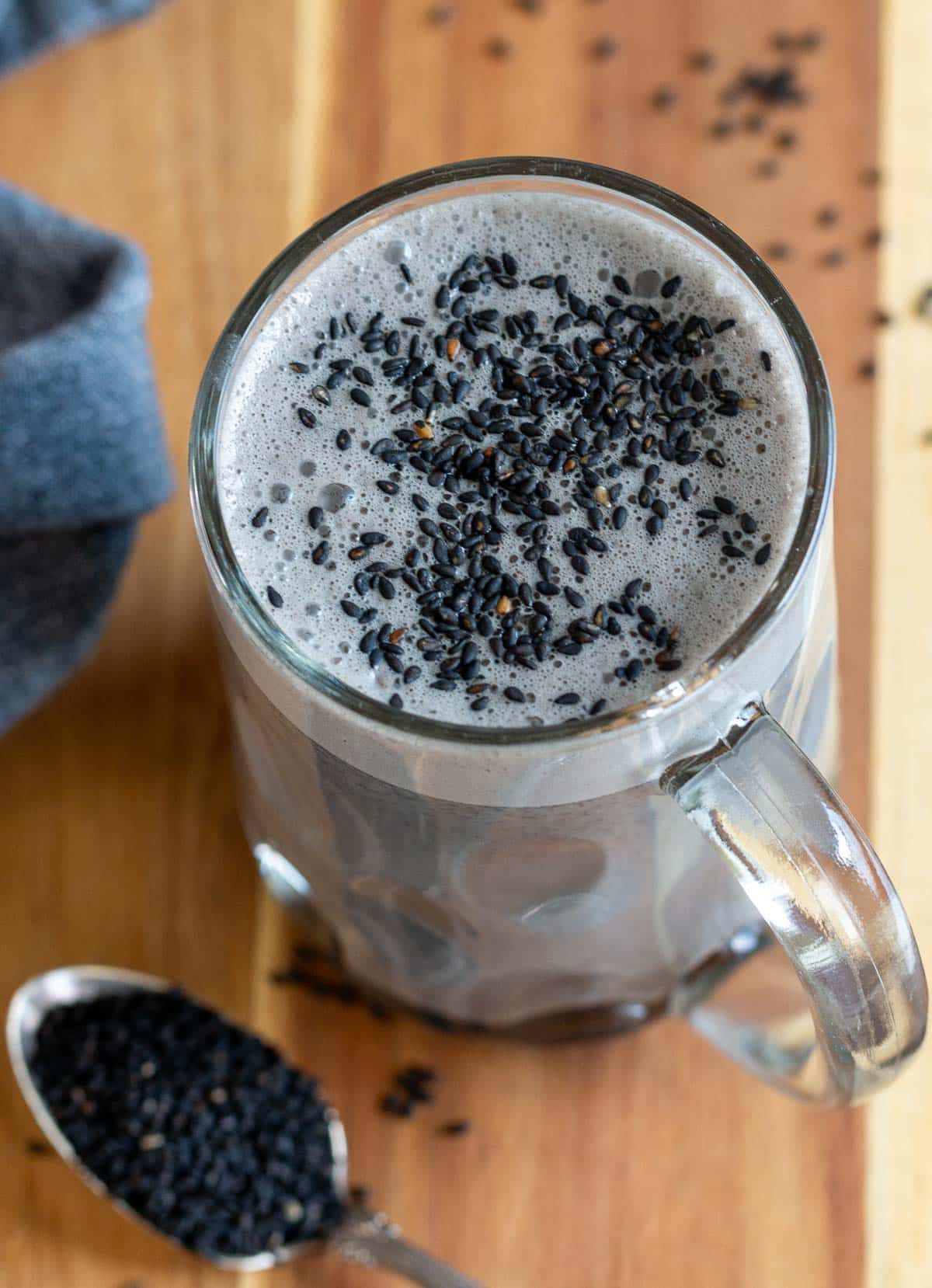 Hot sesame drink topped with sesame seeds.