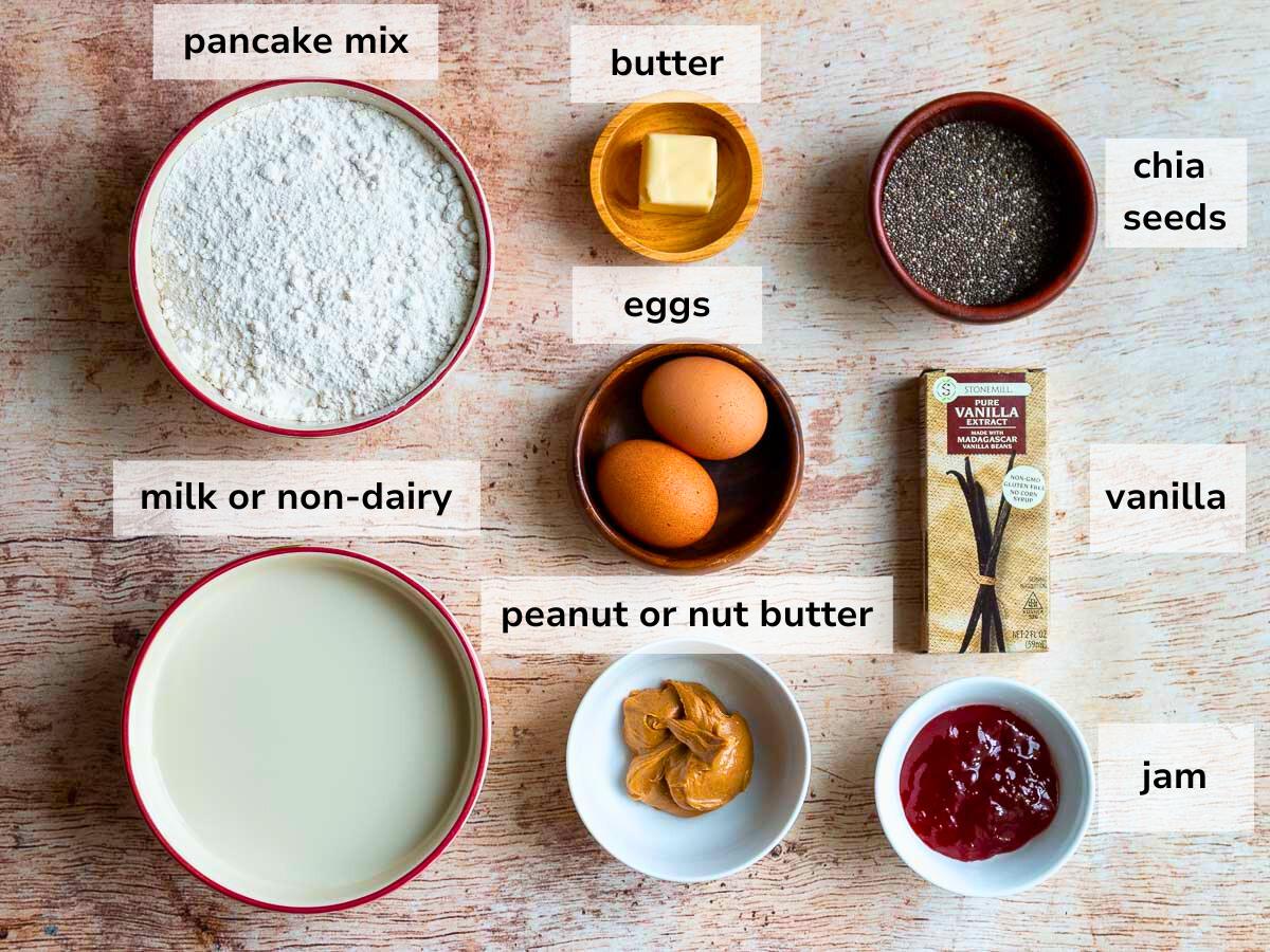 Ingredients to make sheet pan pancakes with chia seeds on a brown table. 