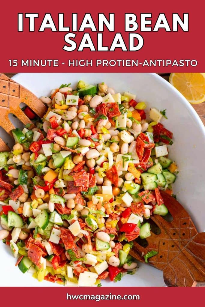Italian bean salad in a large white salad bowl.