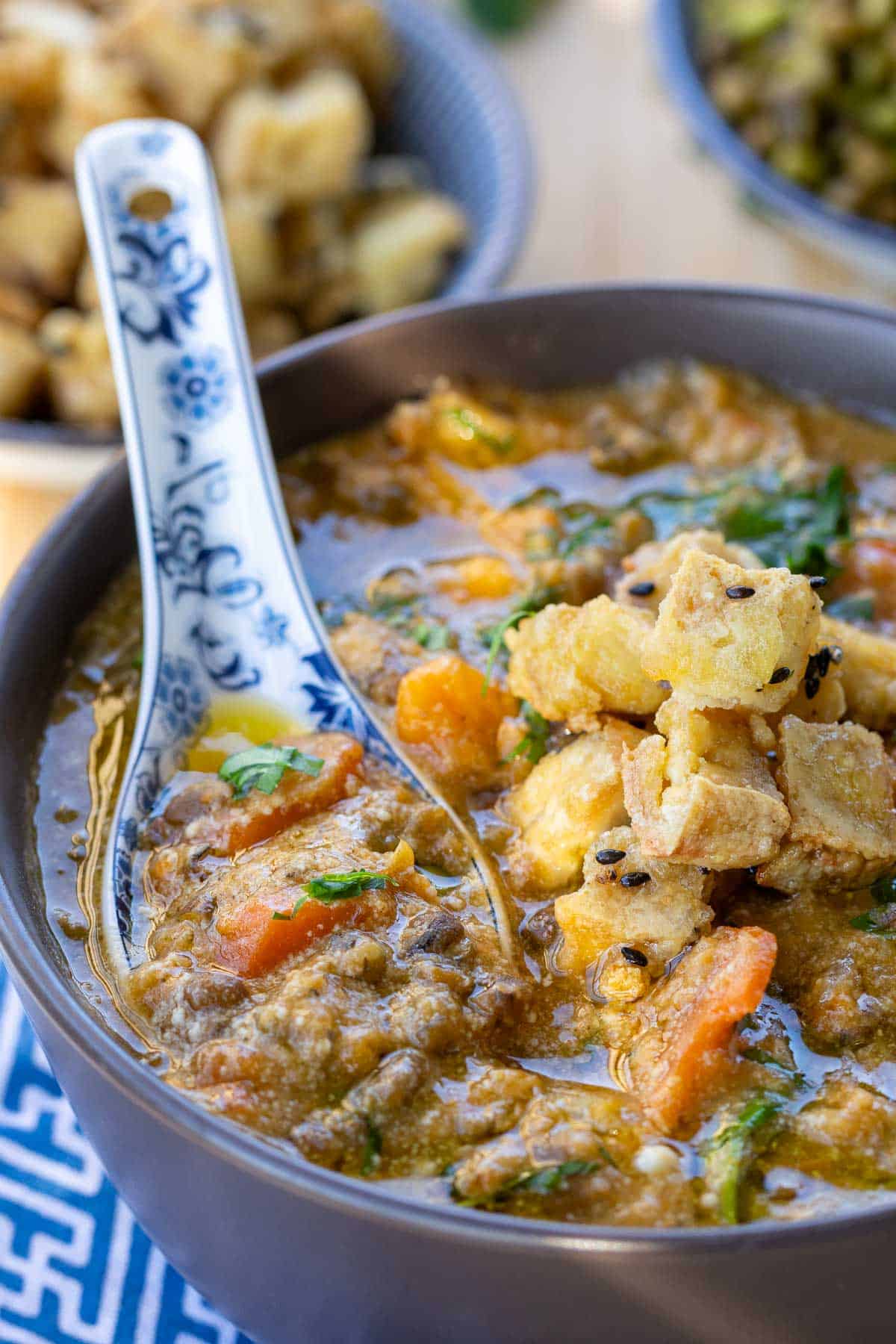Mung bean soup topped with crispy tofu croutons.
