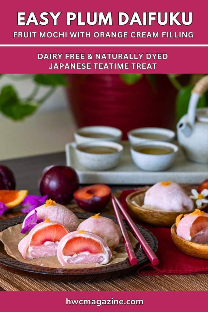 Teatime scene with a Japanese pottery teapot filled with jasmine tea and several plum daifuku.